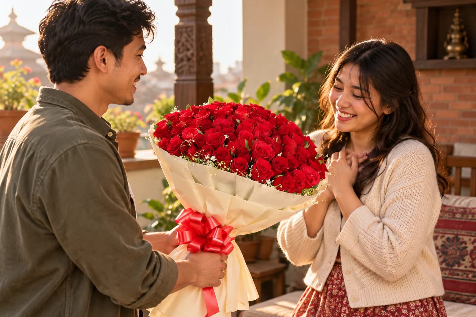 A bouquet of red roses being given as a gift